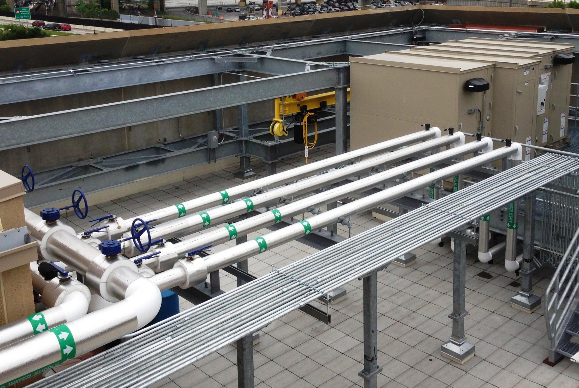 Roof top space is efficiently organized. Overhead pipe routing frees up space.